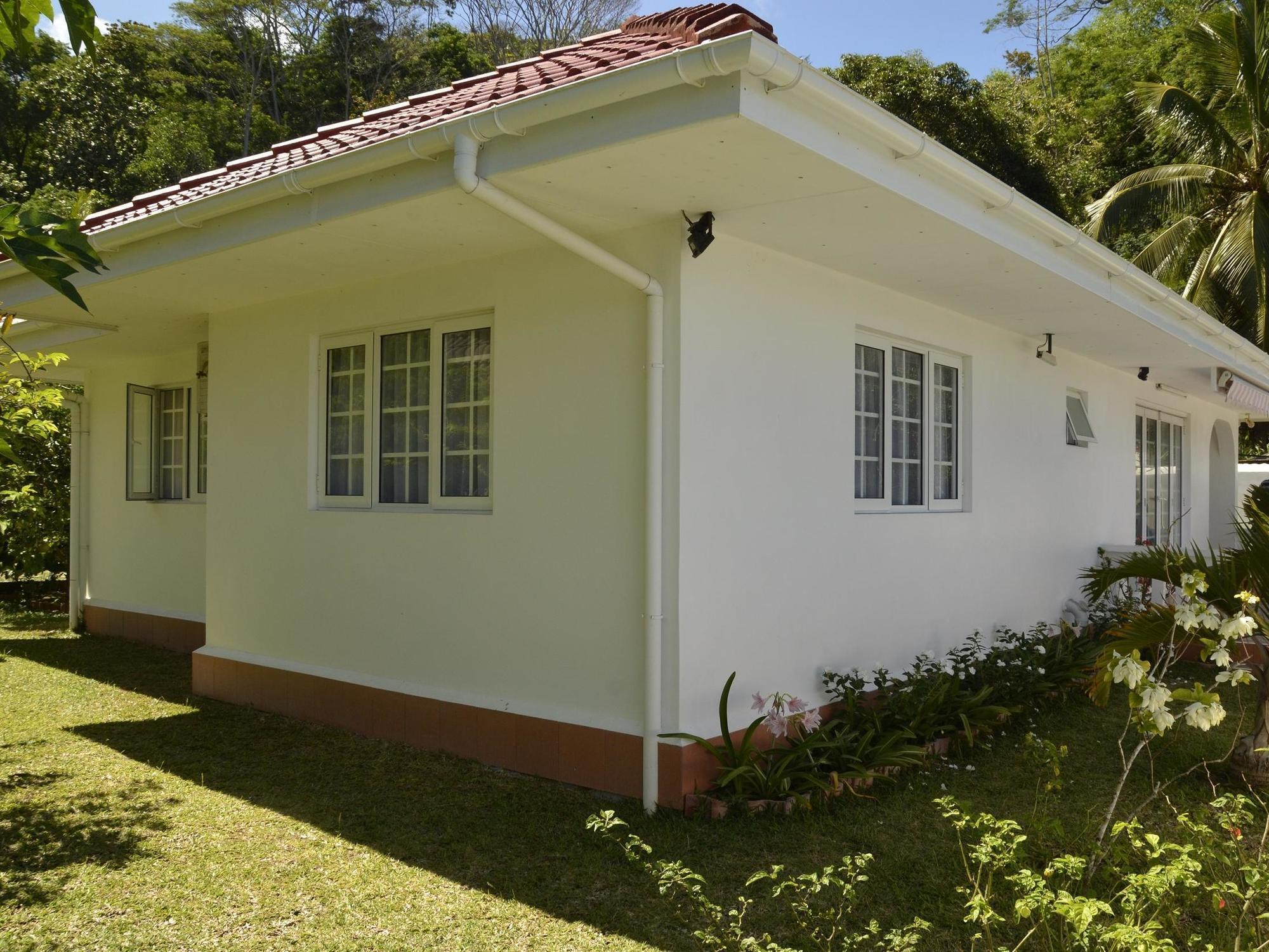 Ixora Villa Anse Royale Bagian luar foto