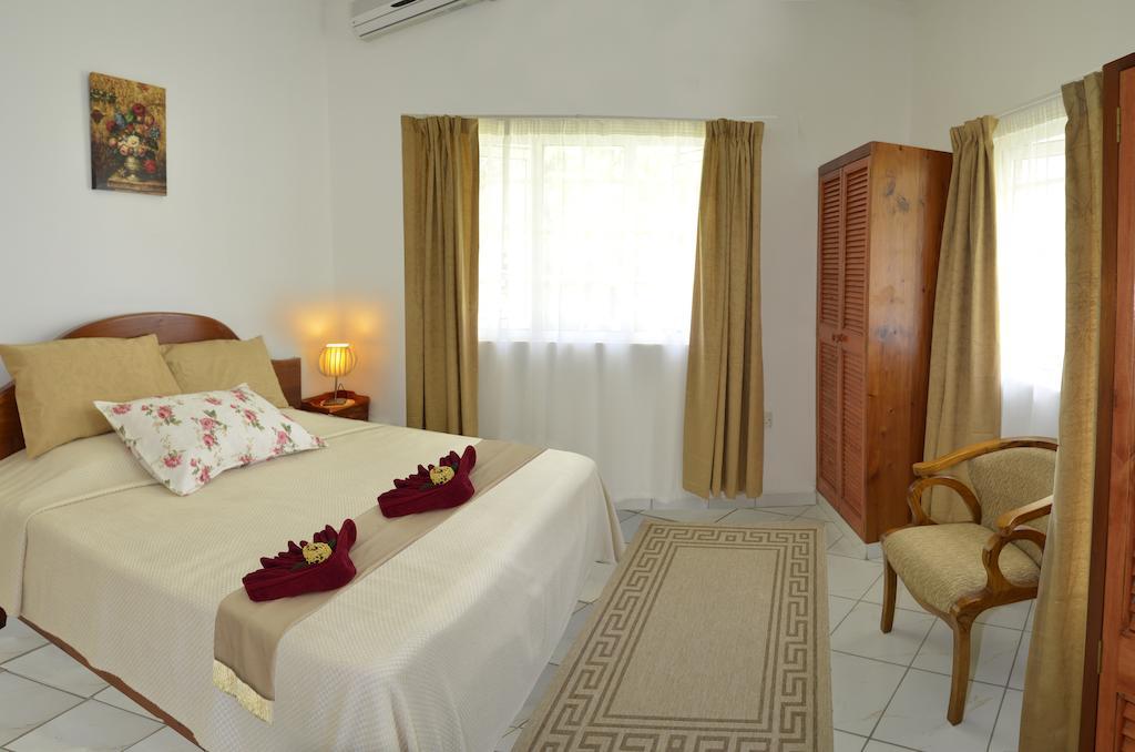 Ixora Villa Anse Royale Ruang foto